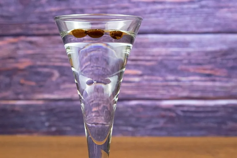 Why Are There Three Coffee Beans in Sambuca? History & Recipe