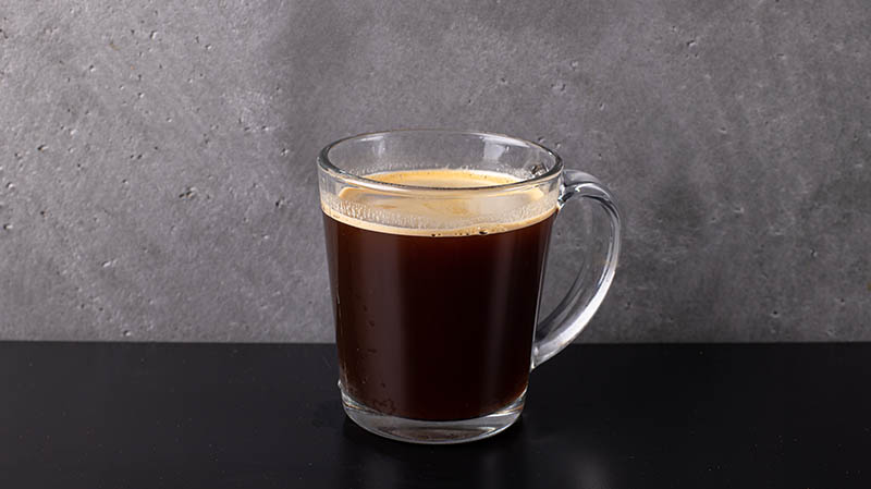 a glass of lungo