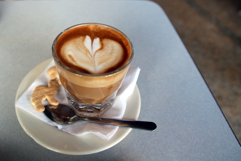 Cortado coffee with animal crackers