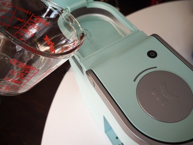 add water to Keurig reservoir