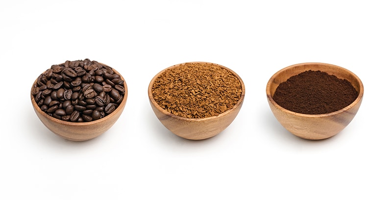 bowls of whole bean, instant coffee, and espresso powder
