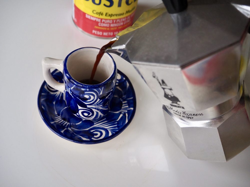 Pour espresso into cup