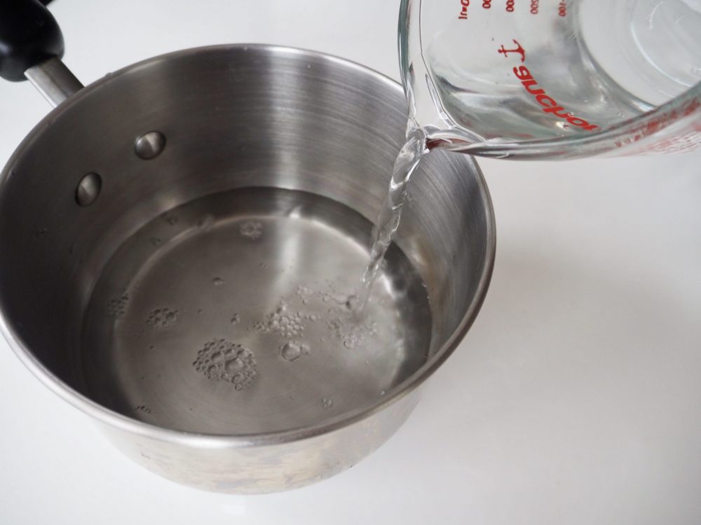 Add water and salt to the pot.