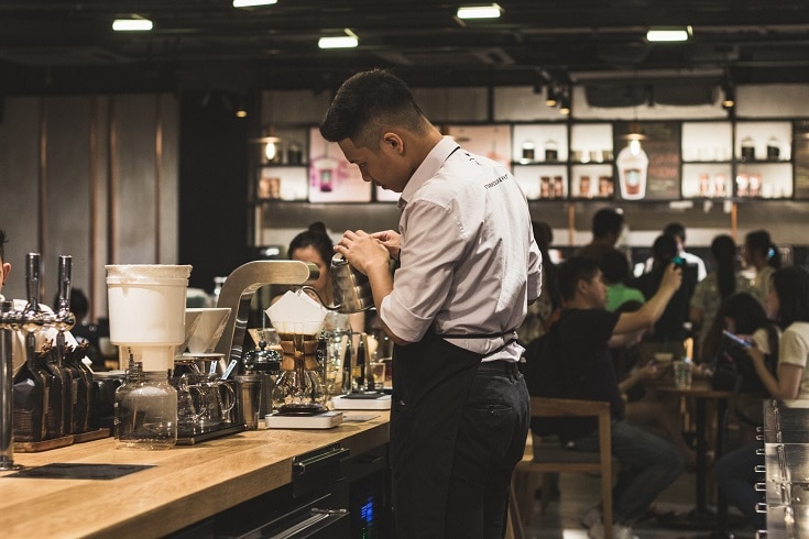 Barista making coffee