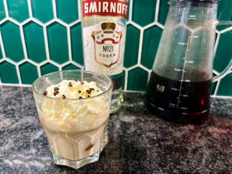 cold brew white russian with cocoa nibs and whipped cream
