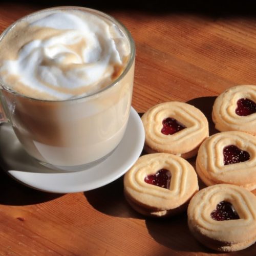 raf coffee frothy espresso with cookies