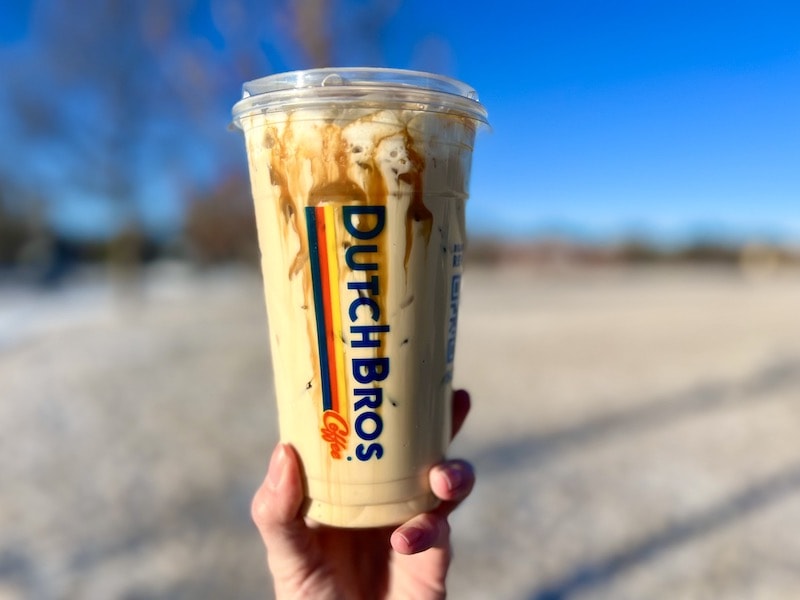 Dutch Bros iced golden eagle caramel drink with whipped cream