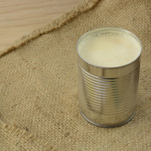 an open can of full of evaporated on burlap