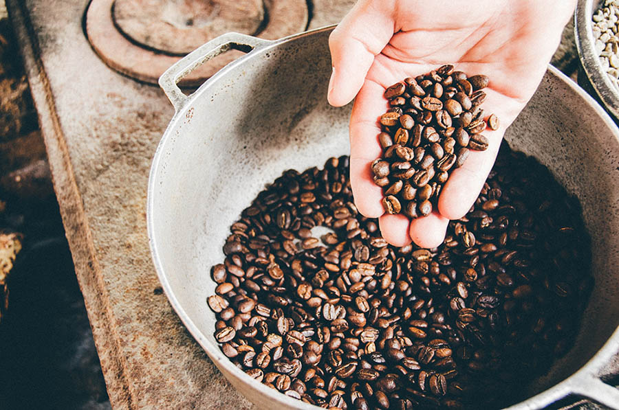 coffee beans in steel wok