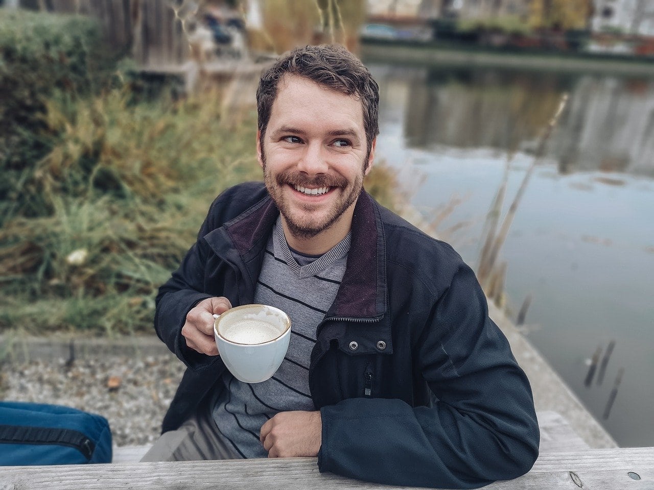 man enjoying a cup of coffee