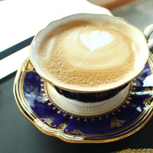 tea latte in an elegant cup with saucer