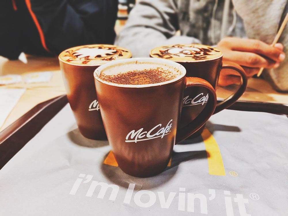 three mugs of mccafe coffee