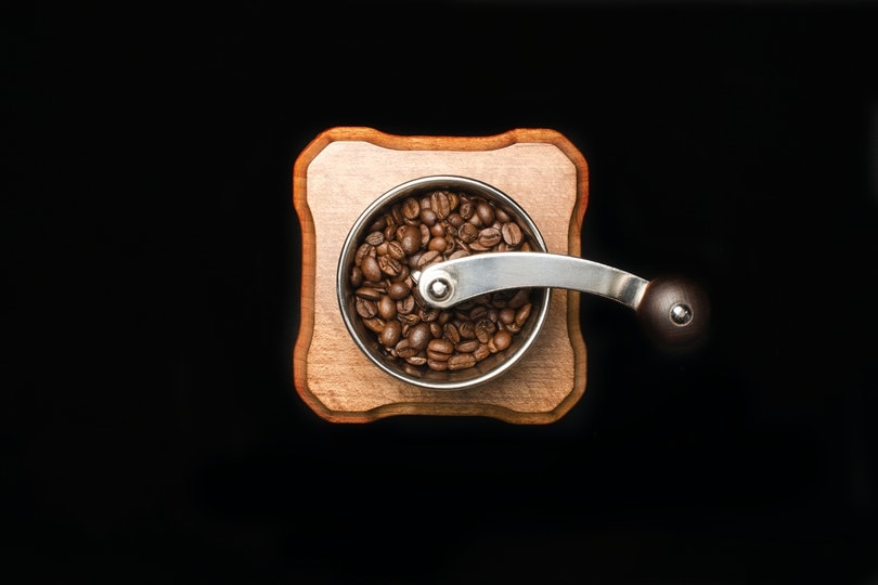 manual coffee grinder with coffee beans