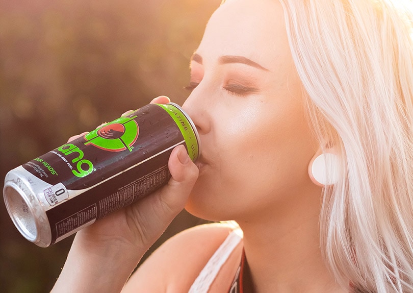 woman drinking bang energy drink