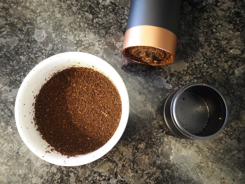 VSSL Java burr grinder with coffee grounds
