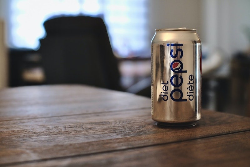 can of diet pepsi on table