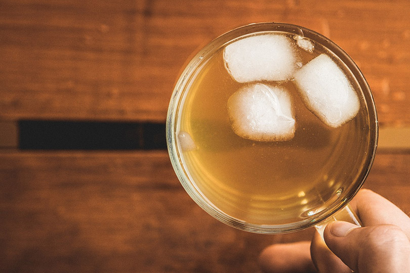 top view of a clear mug of iced tea