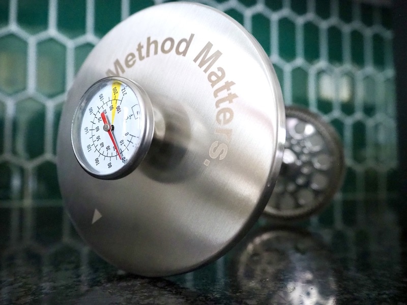 closeup of Barista Warrior French press thermometer and plunger