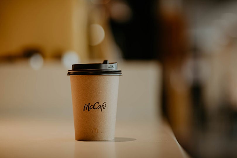 mccafe paper coffee cup on table