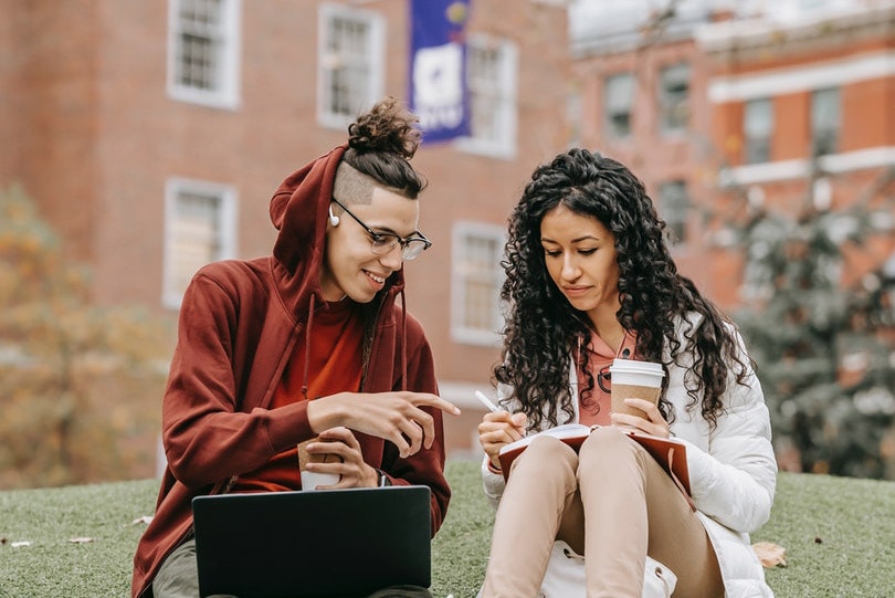 students studying with coffee in their hands
