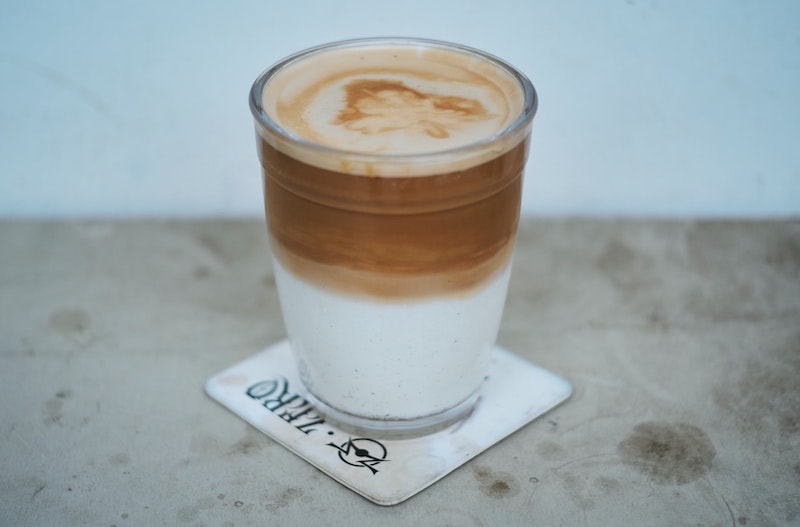 dirty latte espresso layered on top of milk