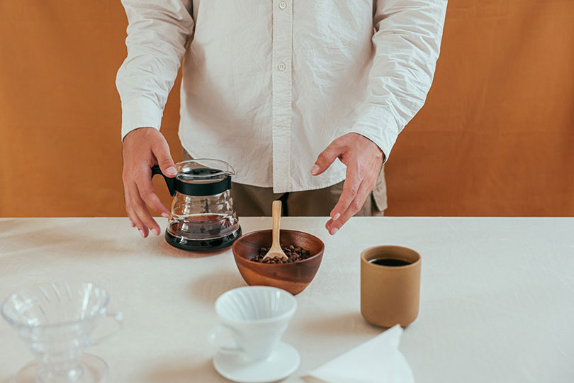 man preparing coffee