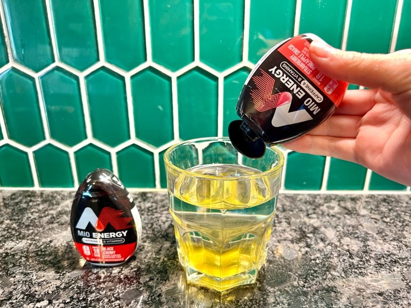 MiO Energy water enhancer pouring into a glass