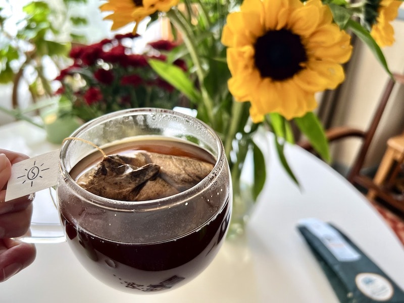 Big Island Coffee Roasters steeping Kona coffee with flowers