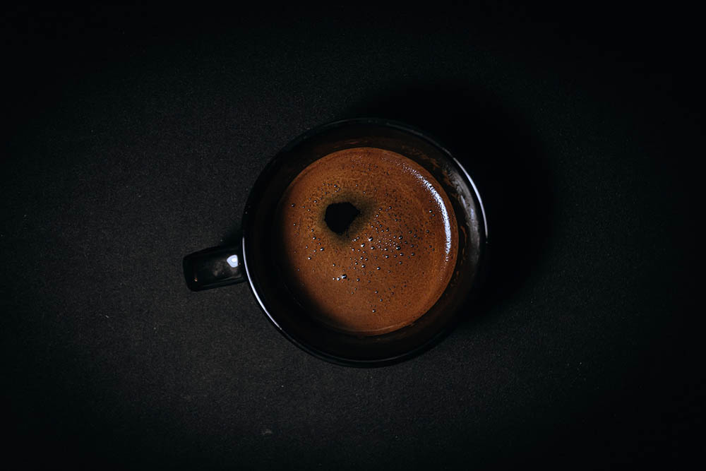 dark roast coffee on a cup