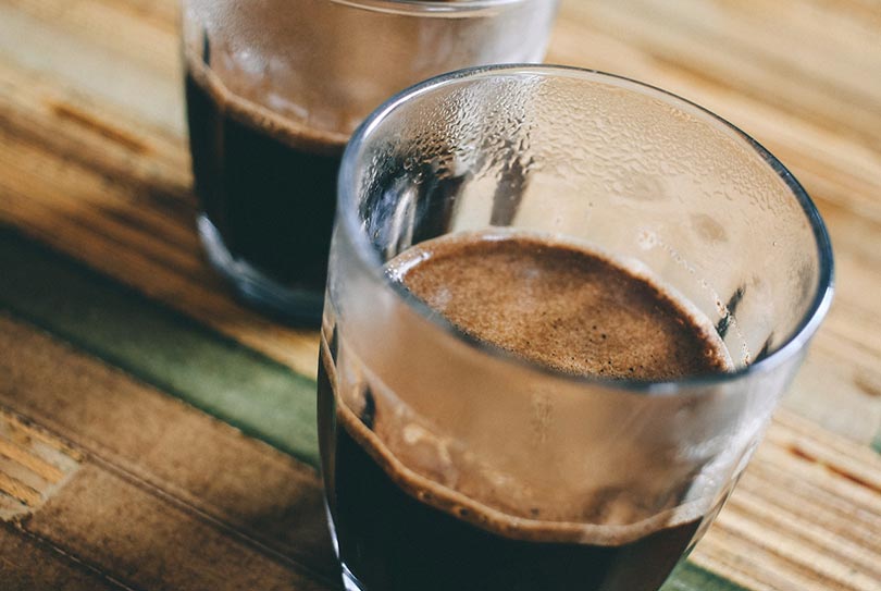 two glass of coffee on table