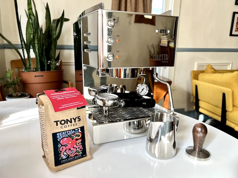 Diletta Mio from Seattle Coffee Gear espresso machine on table with accessories
