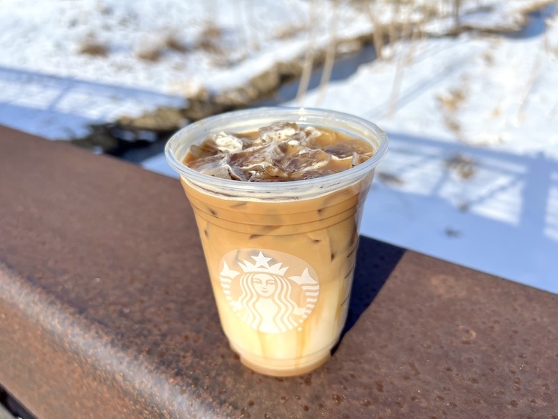 Starbucks iced caramel macchiato in a to-go cup_Kate