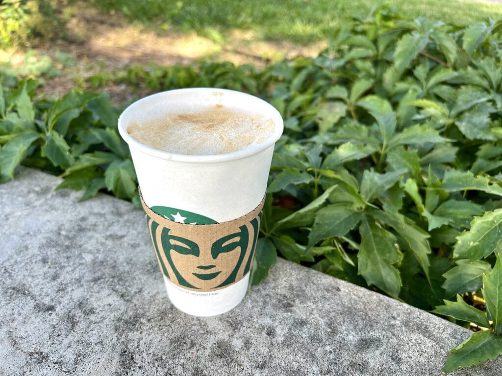 starbucks apple crisp macchiato hot drink with plants